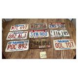 Mixed lot of 9 collectible license plates
