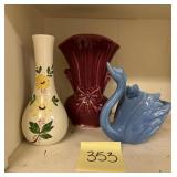 Vintage burgundy Shawnee pottery vase along wit..