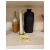 3 vases featuring one vintafe mid-century swung..