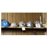 Hard hats and glass bottles