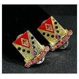Pair of U.S. Army 142nd Field Artillery Regimen..