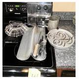 Baguette pan, Egg basket, trivet, knives, flour..