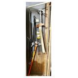Contents of wall (pipe benders, wooden T square..