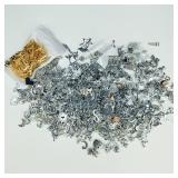 Large Lot of Silver & Gold Toned Pendants/Charms