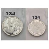 OFFICIAL .999 FINE SILVER SLUG 1 OZ ROUND