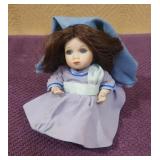 Possibly a Marie Ismand Peace on Earth Porc. Doll