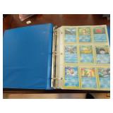 BINDER FULL OF POKEMON TRADING CARDS