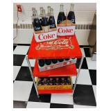 Coke stand with bottles