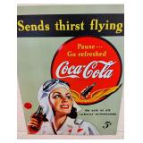 Sends thirst flying Coke Sign