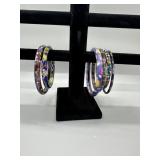 A Collection of Multicolored Cloisonne Style Flora