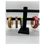 A Collection of Wooden and Beaded Bracelets