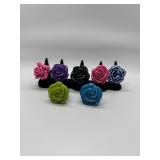 A Collection of Flower Shaped Resin Rings