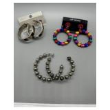 A Collection of Assorted Hoop Style Fashion Earrin