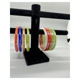 A Collection of Multi-Colored Bangle Bracelets