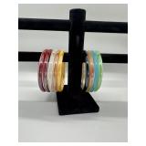 A Collection of Translucent Multi-Colored Bangle B