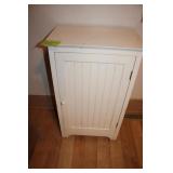 Small White Shelf Used in Kitchen