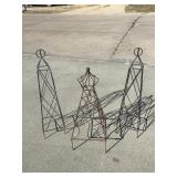 Three obelisk garden trellises
