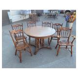 Table With Two Leaves and Six Chairs