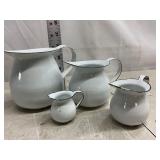 4 piece Miniature Enamel Pitchers