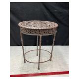 Your plants will thrive on this metal plant stand!