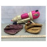 Super Soaker and Ball Gloves