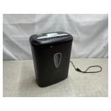 Amazon Basics paper shredder, powers on