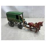 Cast iron horse drawn delivery wagon