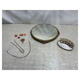 Vanity mirror, lipstick holder, costume jewelry