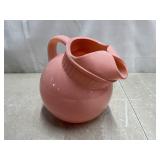 Pink ball, water pitcher