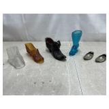 Glass, metal shoe figures