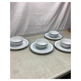 4 bowls and 4 plates. Oneida