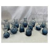 Blue glass bud vases, textured patterns