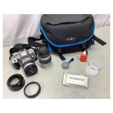 Minolta camera, extra lens, camera bag