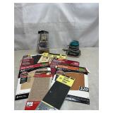 Sander, sandpaper and steel wool