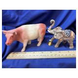 Porcelain Elephant and a plastic cow