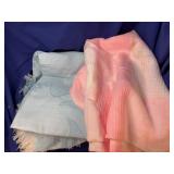 Three Light weight blankets.  Two blue, one pink.