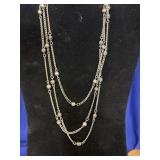 silver-tone chain necklace featuring layered