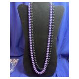 double-strand beaded necklace featuring smooth,