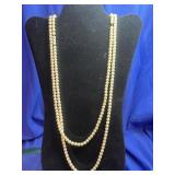 long multi-strand white faux pearl necklace