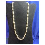 classic single-strand white pearl necklace