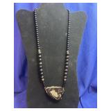 handcrafted beaded statement necklace featuring a