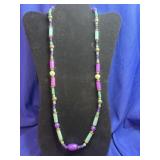 Multicolored purple and light green tube beads,