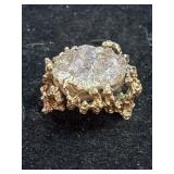 freeform yellow gold colored ring featuring a