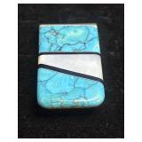 money clip featuring a geometric inlay of vibrant