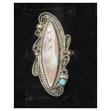 Southwestern-style silver ring featuring an