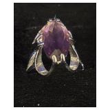 silver-tone ring featuring a radiant pink