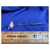 gold-toned metal bookmark with a decorative Goose