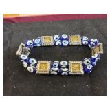 blue glass evil eye stretch bracelet with square