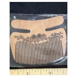 Chinese light wood hair comb sealed in a clear