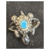 silver turtle ring featuring a textured shell and